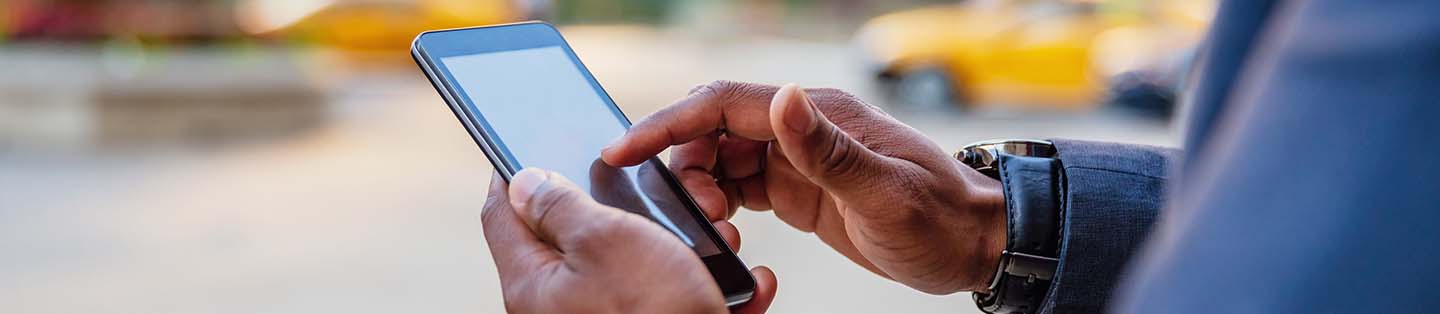 a guy scrolling on his phone